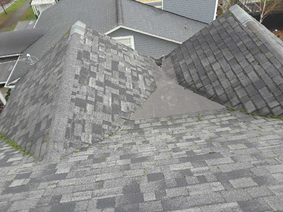 Valley of a Roof Needing Maintenance